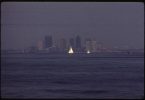 a city skyline seen through hazy air